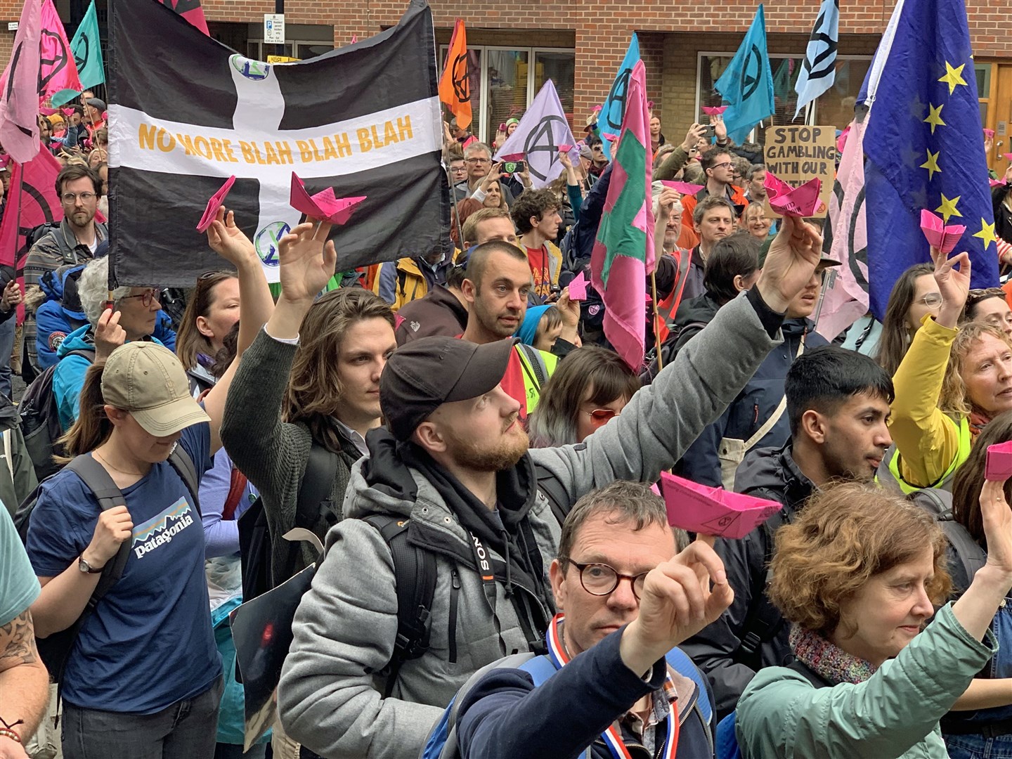 Extinction Rebellion demonstrators hold a small boats protest outside the Home Office in central London (Lucas Cumiskey/PA)