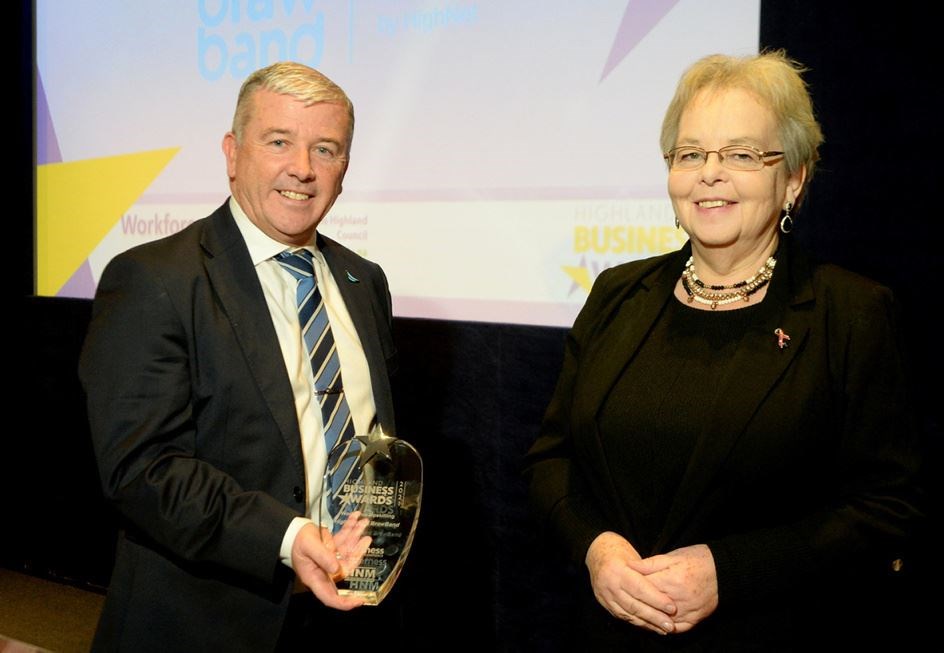 David Siegel, HighNet, receives the Workforce Upskilling Award from Trish Robertson, Chair, Economy and Infrastructure Committee, Highland Council. Picture: James Mackenzie.