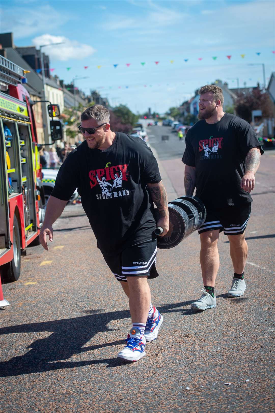 Luke and Tom Stoltman do the heavy lifting.  Photo: Callum Mackay.