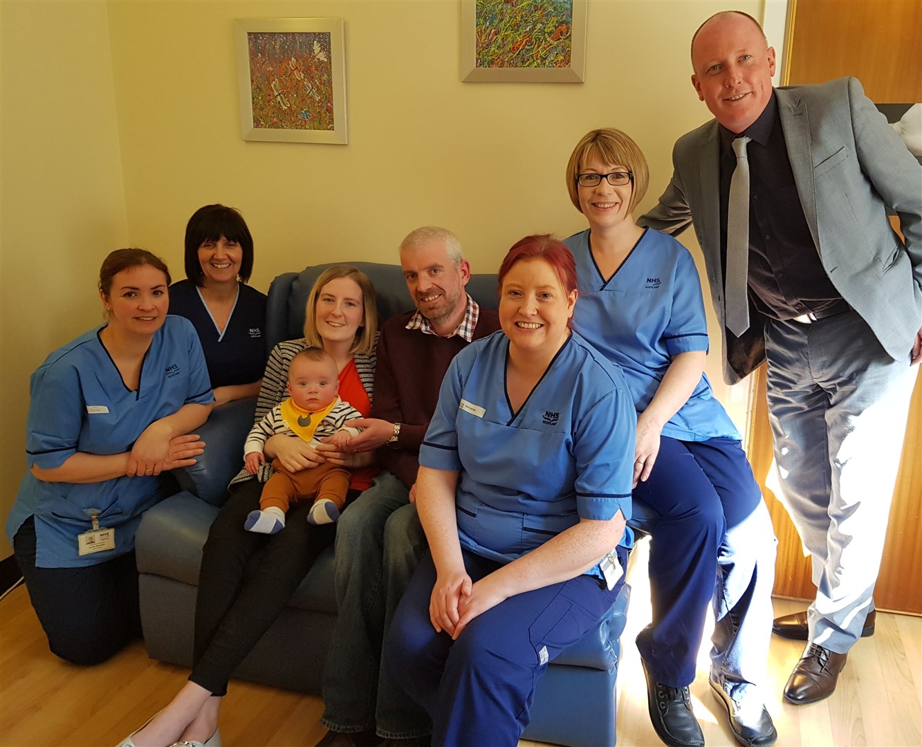 Hannah and Robert Toohill with baby Fraser, Chris Smith (right) and baby unit staff.