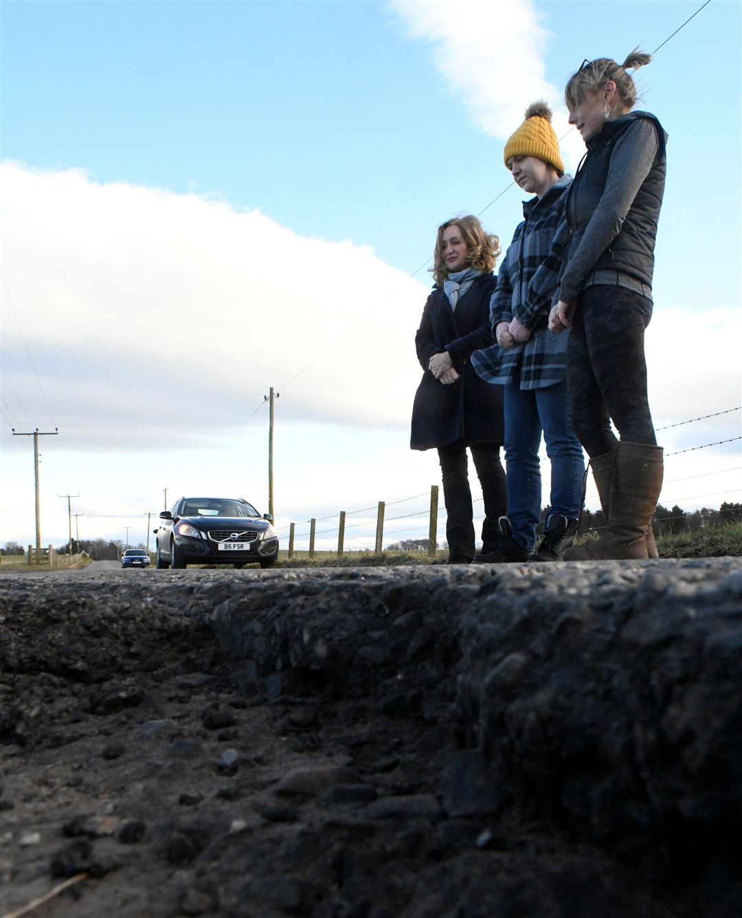 People from Balintore area turning out to say enough is enough over potholes in the area: Fiona Robertson, Jody Mackay and Leighanne Hodgkin, local residents. Picture: James Mackenzie.