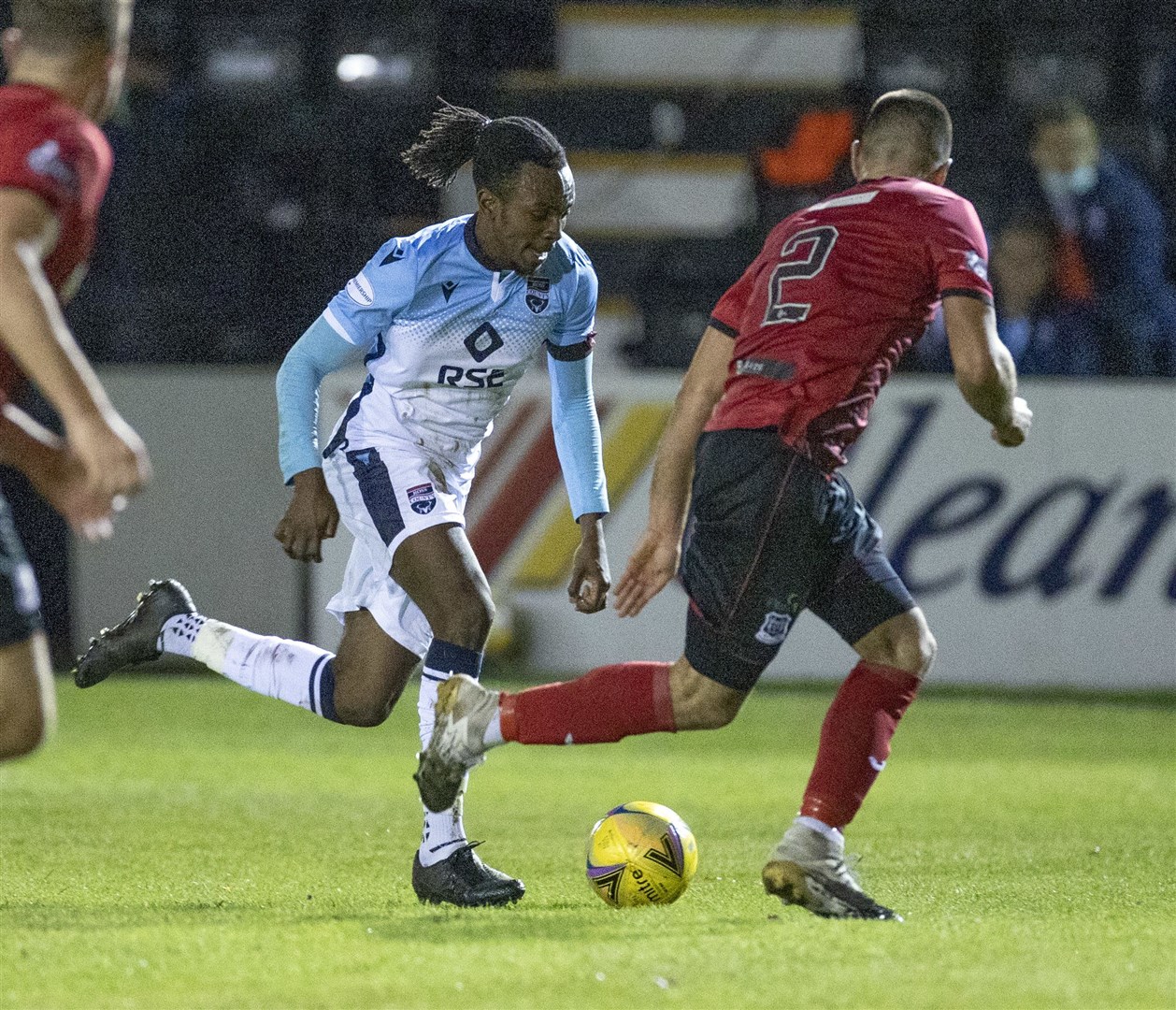 Picture - Ken Macpherson, Inverness. Betfred Cup Group stage. Elgin City(1) v Ross County(4). 10.11.20. Ross County's Regan Charles-Cook gets past Elgin City's Matthew Cooper.