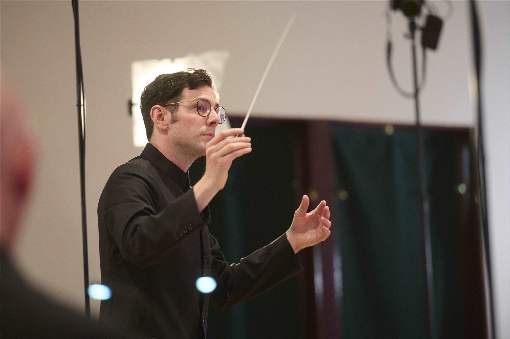 Tomas Leakey conducting the Mahler Players. Picture: Ewen Weatherspoon