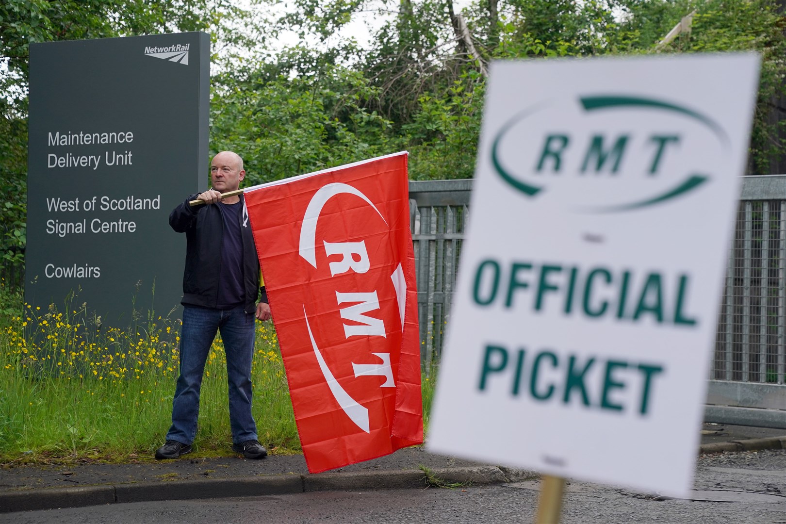A picket line outside the Network Rail Maintenance Delivery Unit and West of Scotland Signal Centre in Cowlairs, Glasgow (Andrew Milligan/PA)