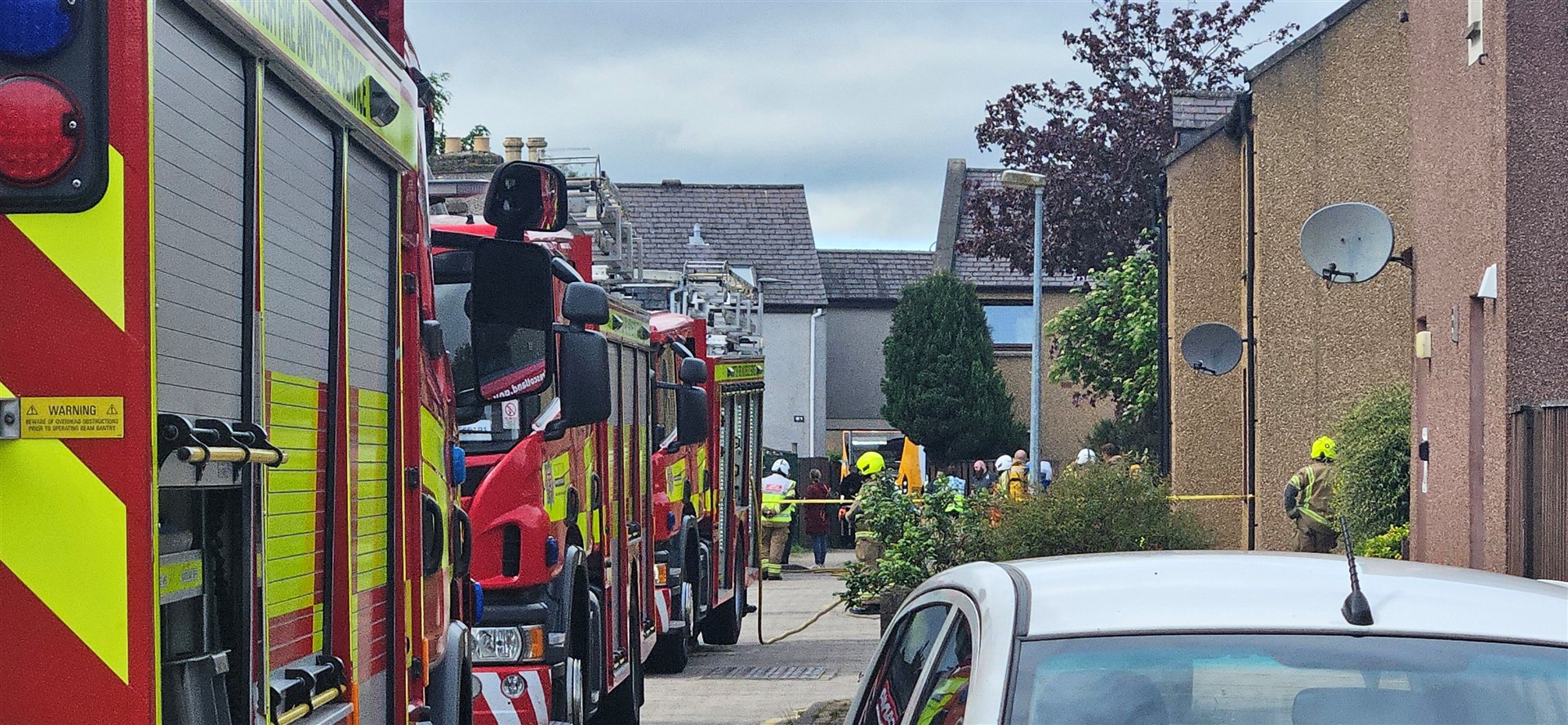 The Scottish Fire and Rescue Service said it had sent three appliances to the scene, which can be seen here in Muirtown Street.