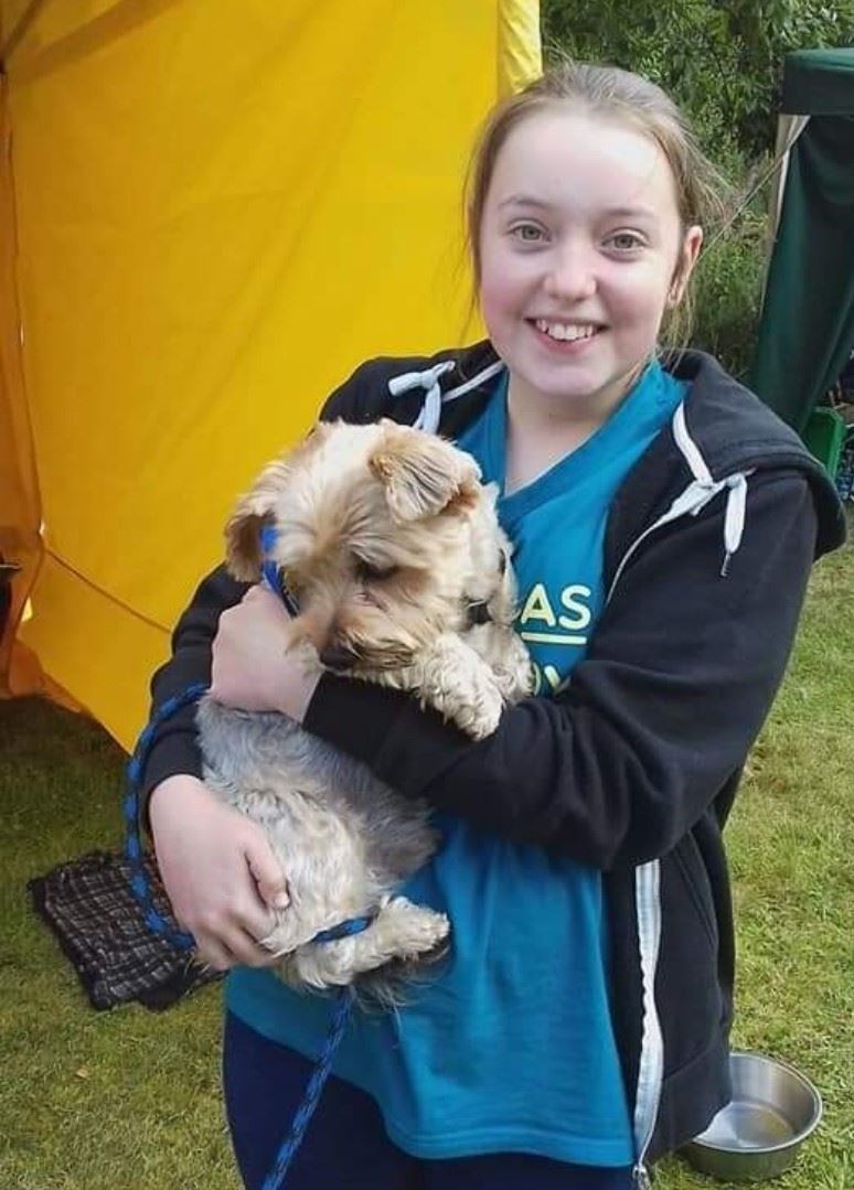Adrian's daughter Hannah (18) was afraid of dogs as a child, and now works to support the charity after Pets as Therapy helped overcome her phobia.