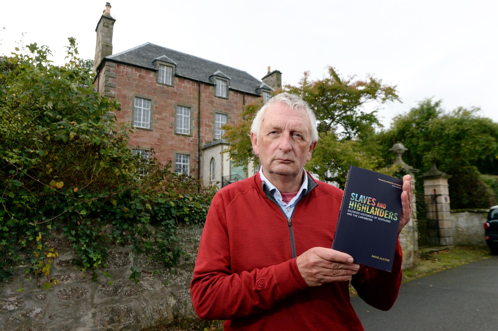 David Alston with his book, Slaves and Highlanders. Picture: James Mackenzie