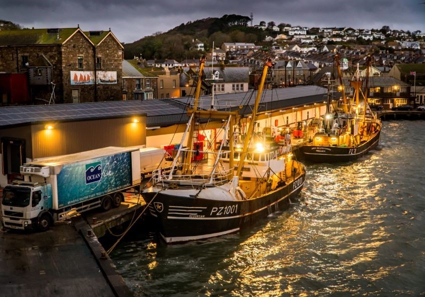 Laurence Hartwell-Beam's shot of trawlers landing to the fish market at night.