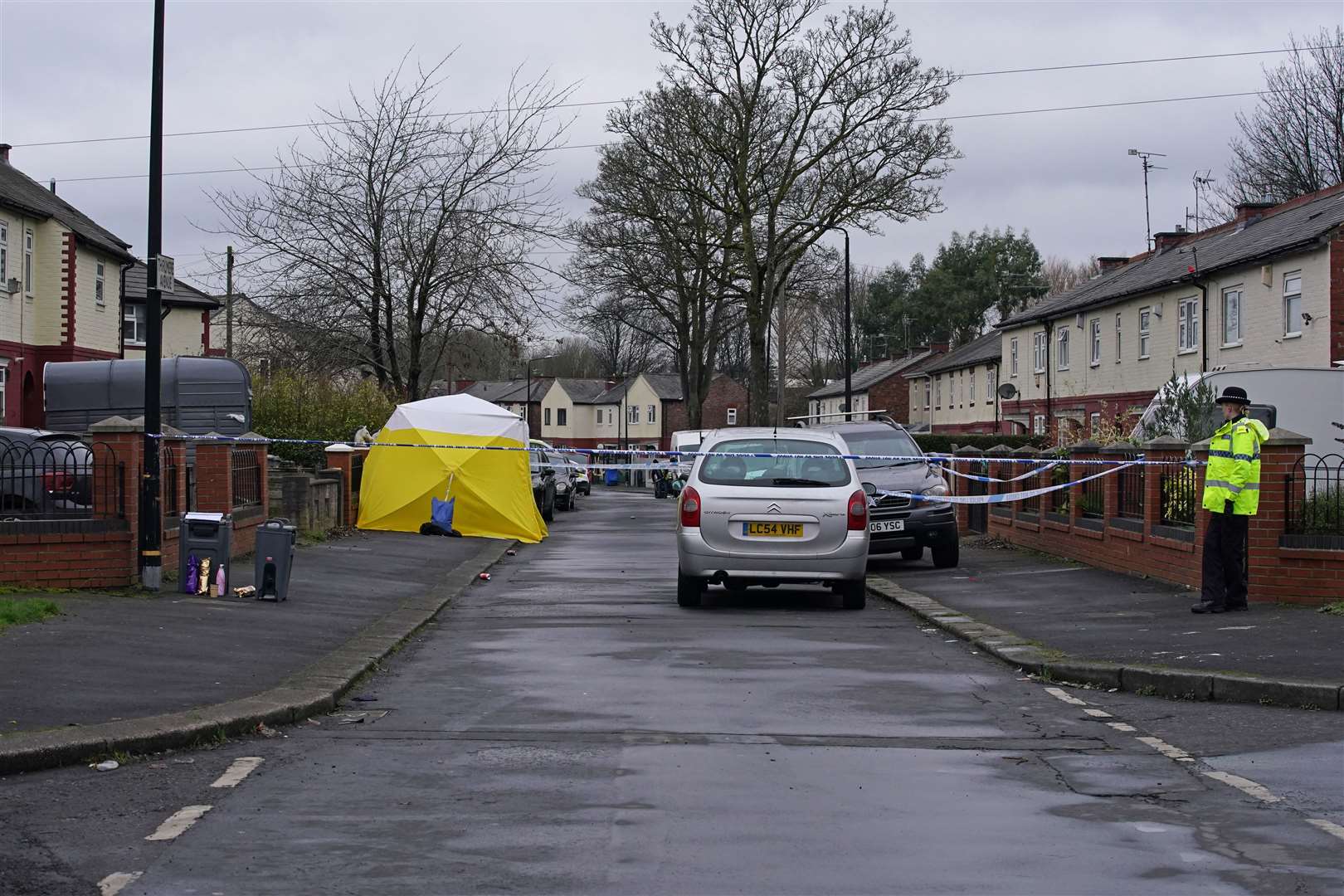A forensic tent on Thirlmere Avenue in Stretford, Manchester, near to where a 16-year-old boy was fatally stabbed (Peter Byrne/PA)