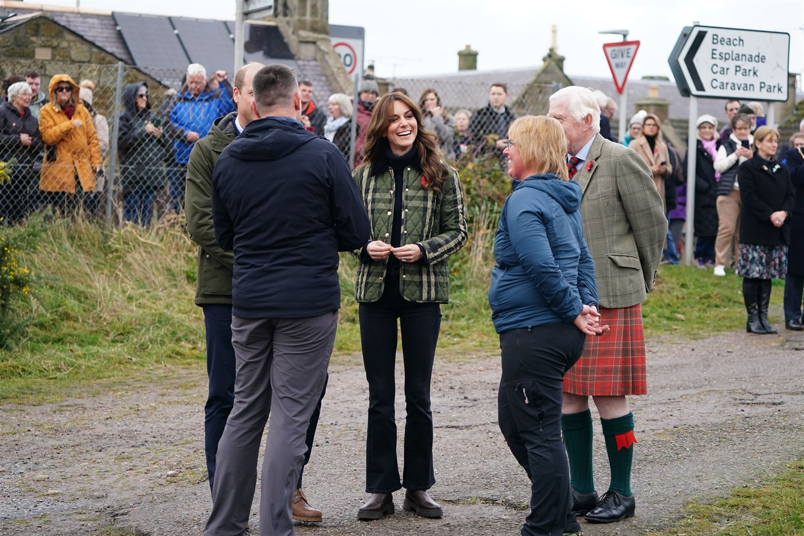 A crowd turned out to see the royal couple arrive in Burghead (Jane Barlow/PA)