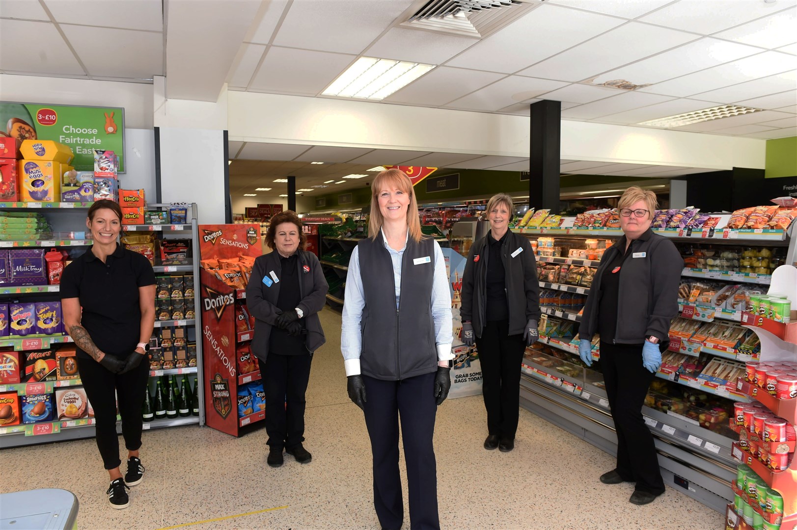 Coop Invergordon manager Lorraine Davidson (centre) with staff Stacey Brown, Jackie Mcilvenny, Lorna Stefaniak and Madge McFaul. Picture: Callum Mackay