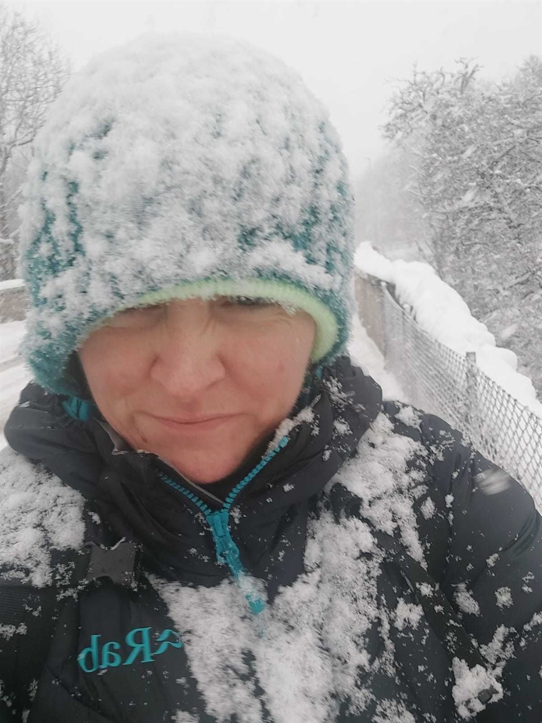 NHS Highland community nurse battling the severe weather conditions. Picture: NHS Highland Facebook.