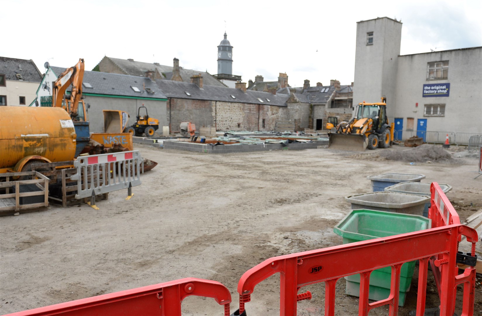 The town centre project will provide flats to be managed by Highland Council plus two private retail units.