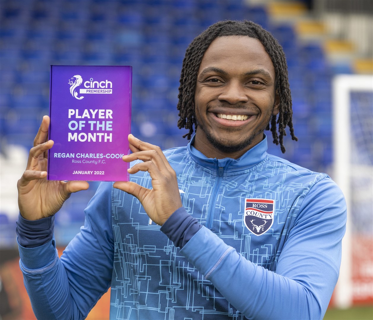 Ross County's Regan Charles-Cook pictured with his Scottish Premiership player of the month award for January 2022. Picture: Ken Macpherson