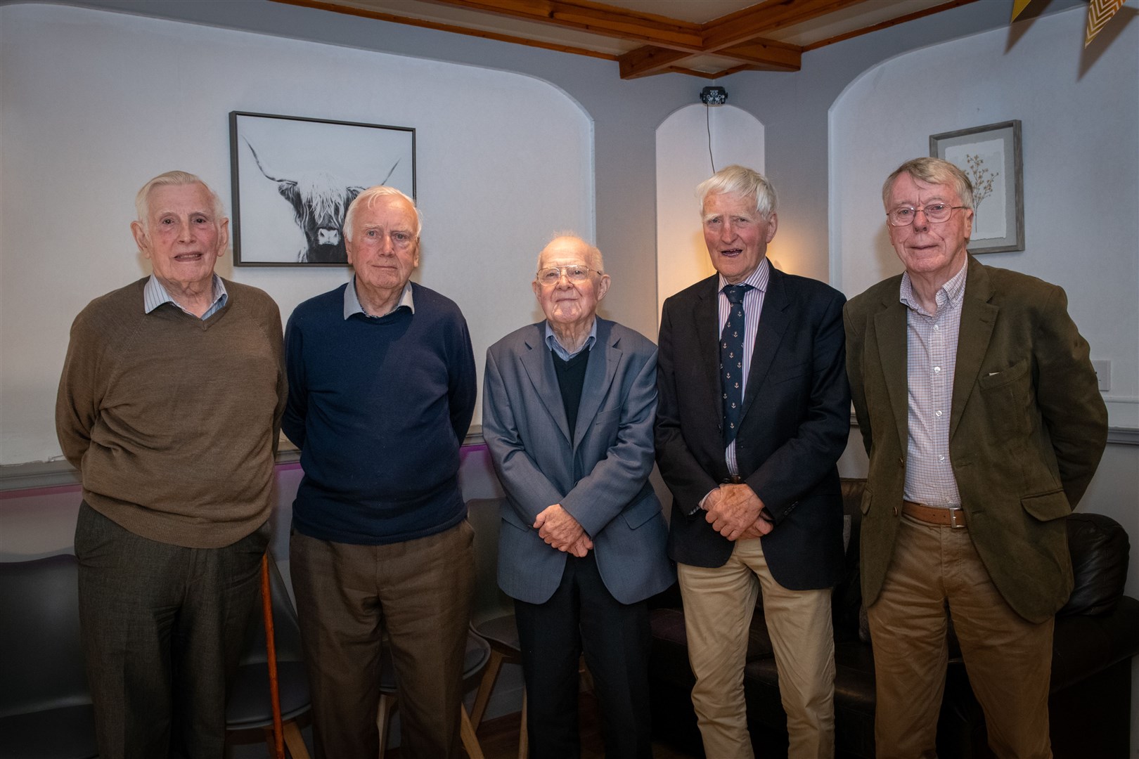 Reuniting to catch up and recall old times at The Cottage Bar in Maryburgh were Sandy Macdonald, Eric Munro, John C. Mackay, John A MacRae and Roy MacIntyre. Picture: Callum Mackay