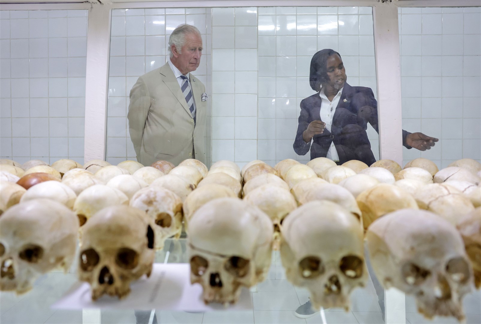 The Prince of Wales is shown the skulls of victims (Chris Jackson/PA)
