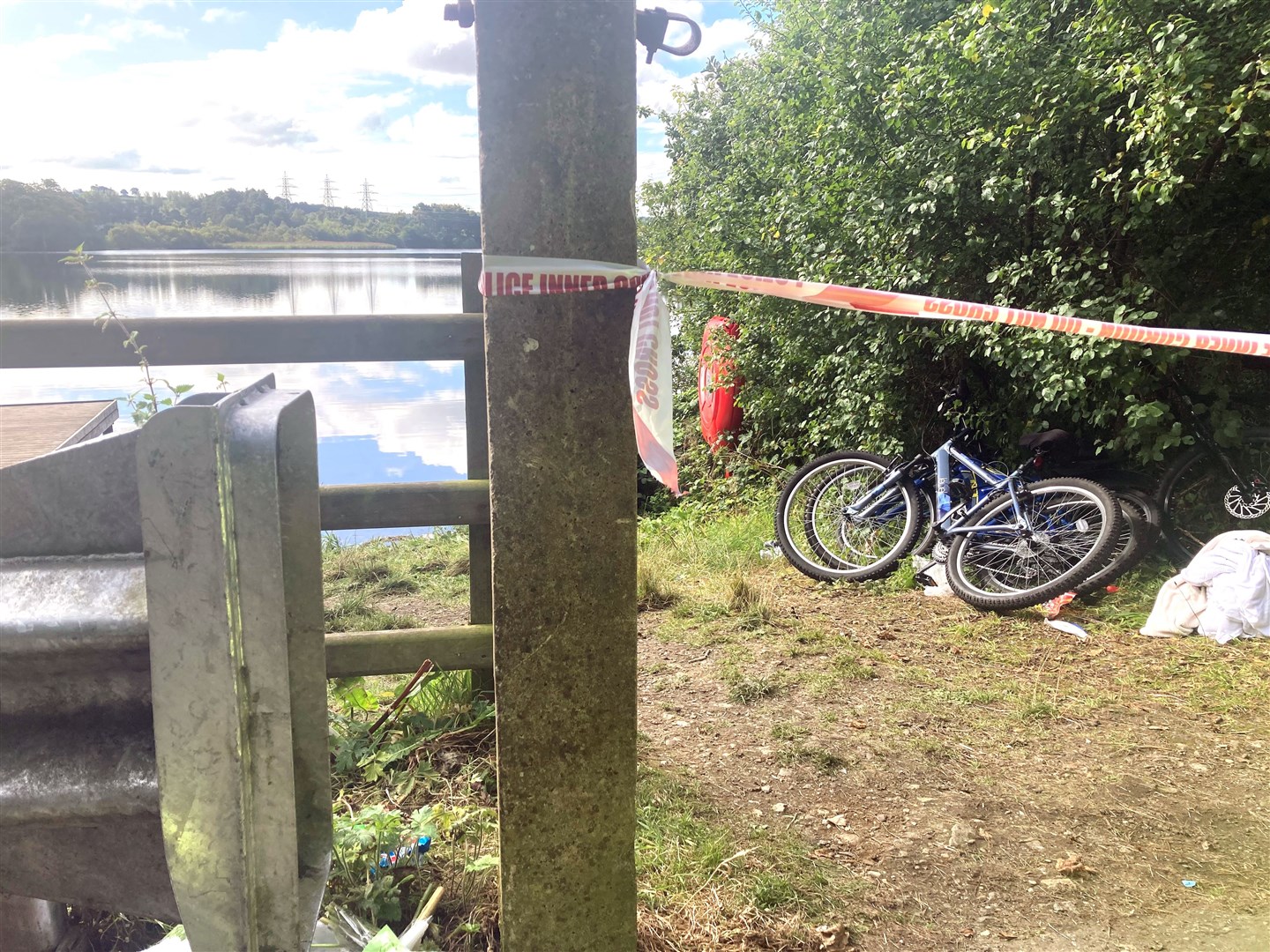 The scene at Enagh Lough on the outskirts of Londonderry where two boys died after getting into trouble in the water on Monday evening. (PA)