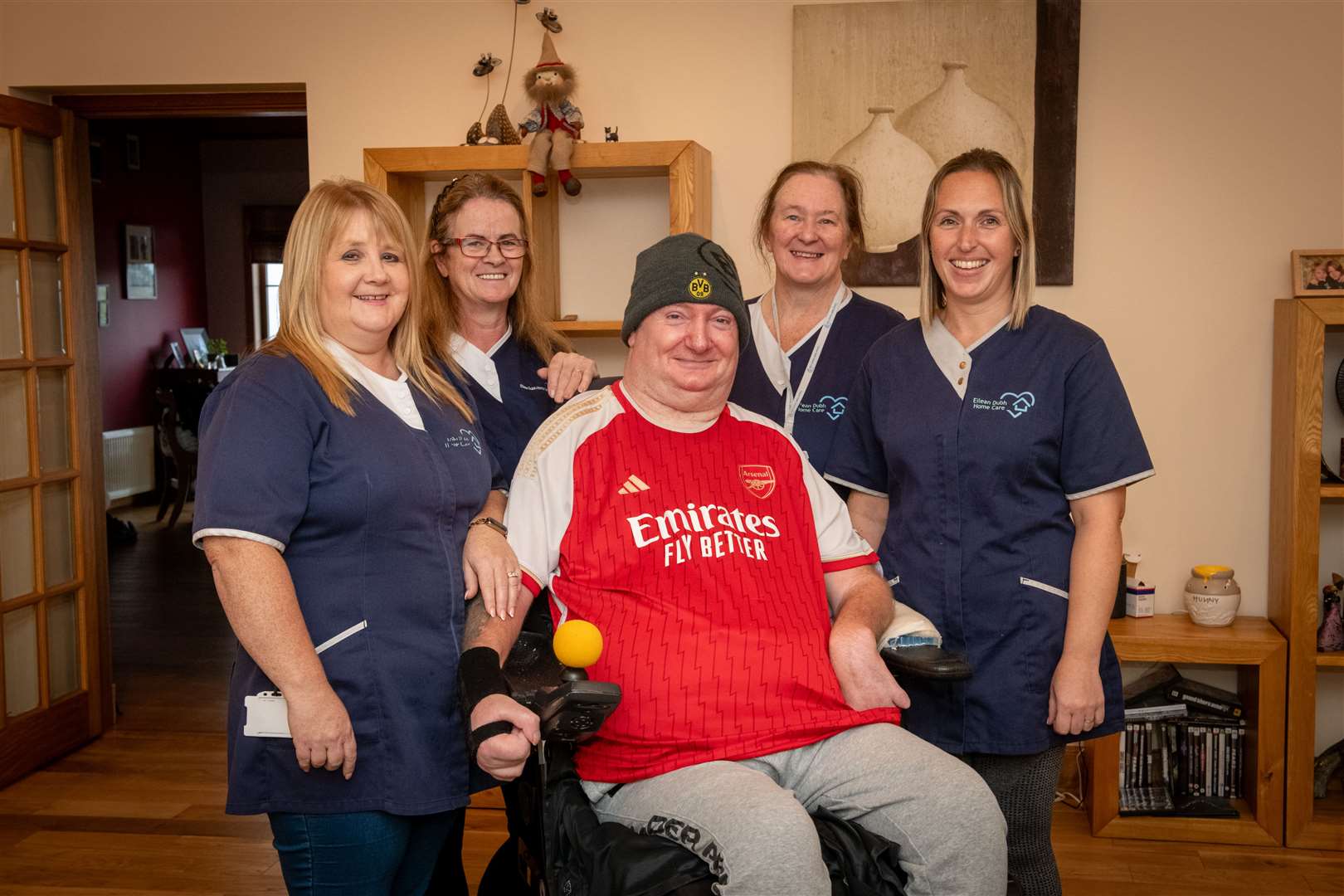 Carers Paula Bremner, Evelyn Cameron, Karen Gunn and Kimberley Leslie all contribute to lifeline care helping people like Iain Roy live at home. Picture: Callum Mackay.