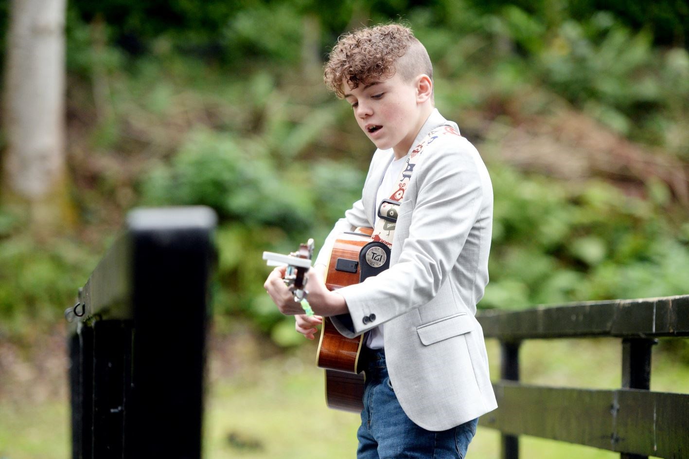 James Macgillivary (13) has already played to thousands of people on stage and busking.