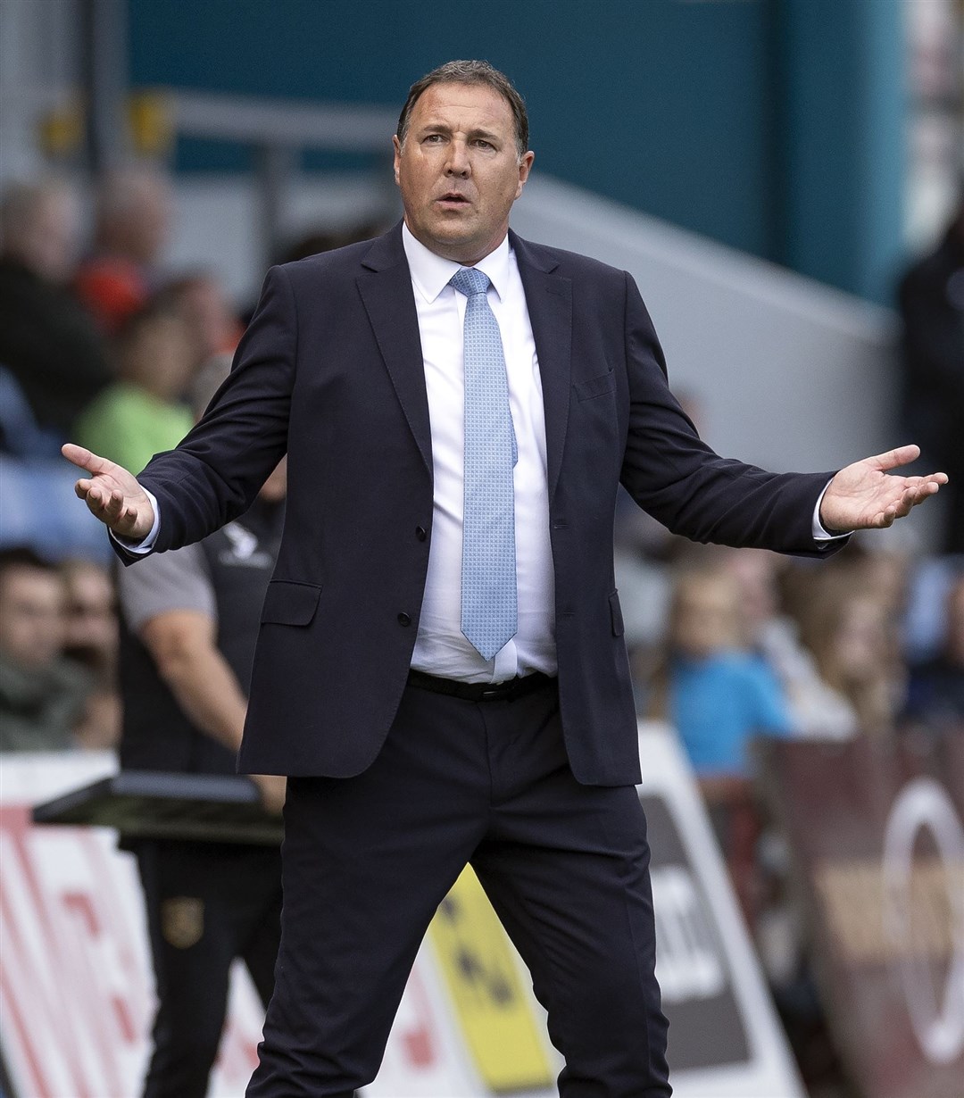 Malky Mackay is desperate for his players to overcome Aberdeen and create their own legacy at Ross County. Picture: Ken Macpherson