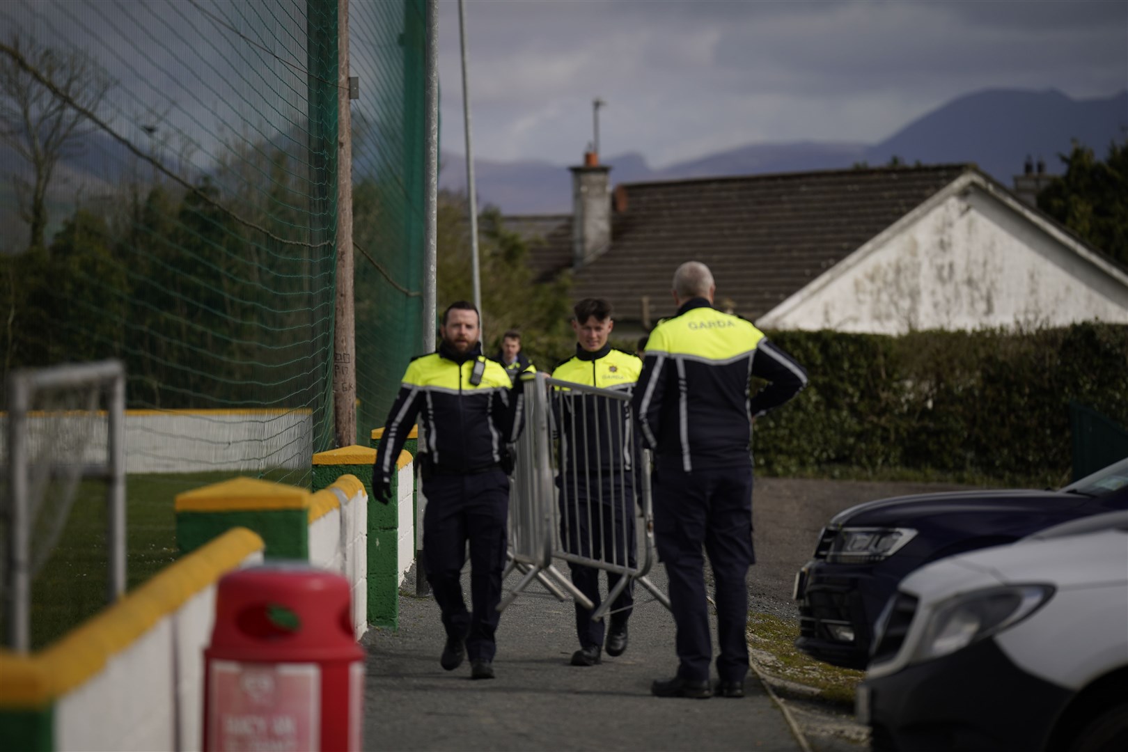 A garda security cordon is put into place at Cooley Kickhams GAA Club (Niall Carson/PA)