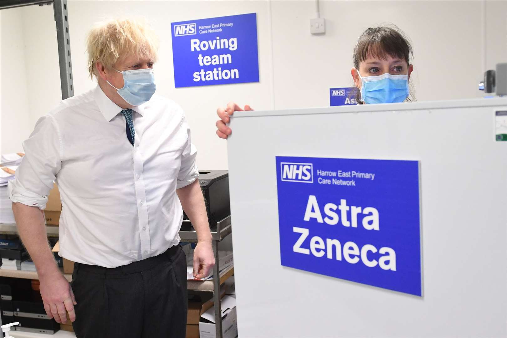 Boris Johnson is shown the distribution operation for sending the Oxford/Astrazeneca coronavirus vaccine out to local clinics during a visit to Barnet FC’s ground (Stefan Rousseau/PA)