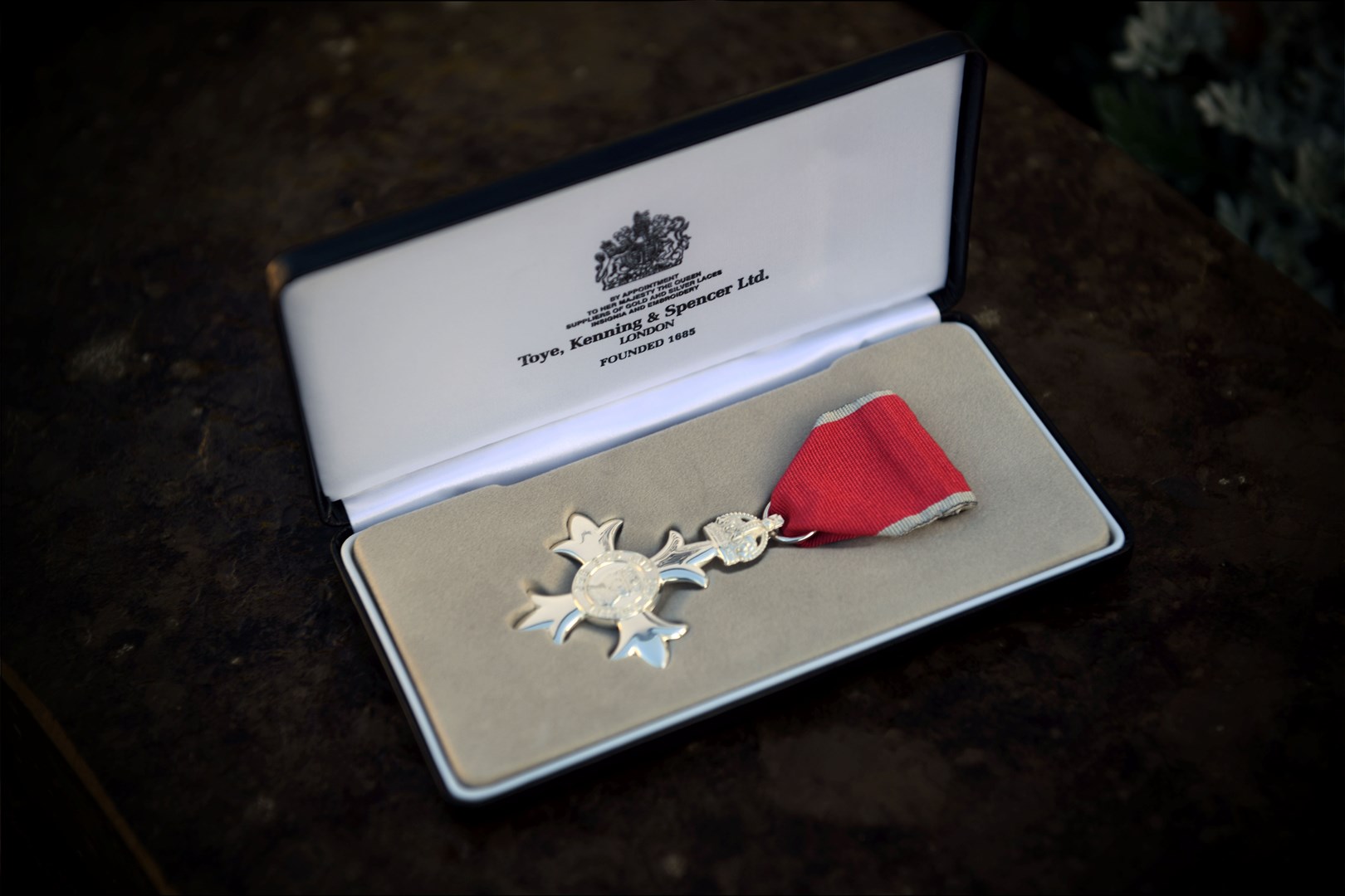 The medal in its presentation box.