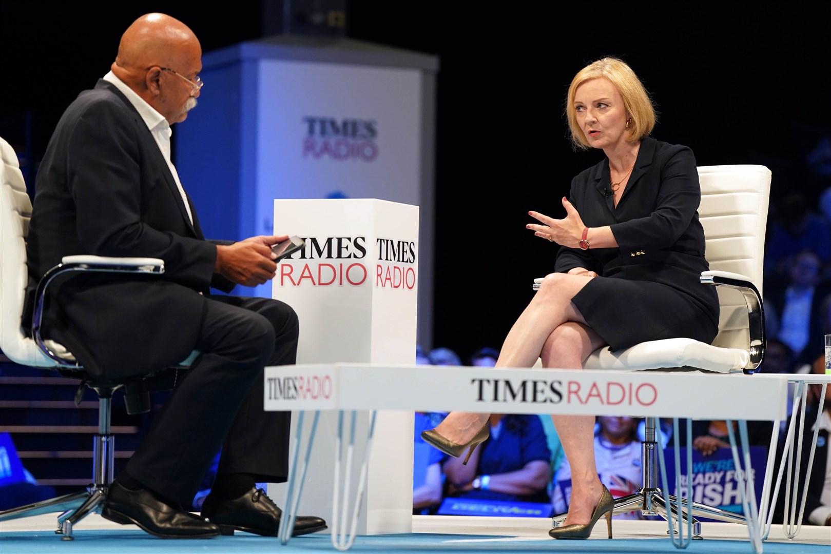 Times Radio presenter John Pienaar speaking to Liz Truss during a hustings event at the NEC in Birmingham as part of their campaign to be leader of the Conservative Party and the next prime minister (Jacob King/PA)