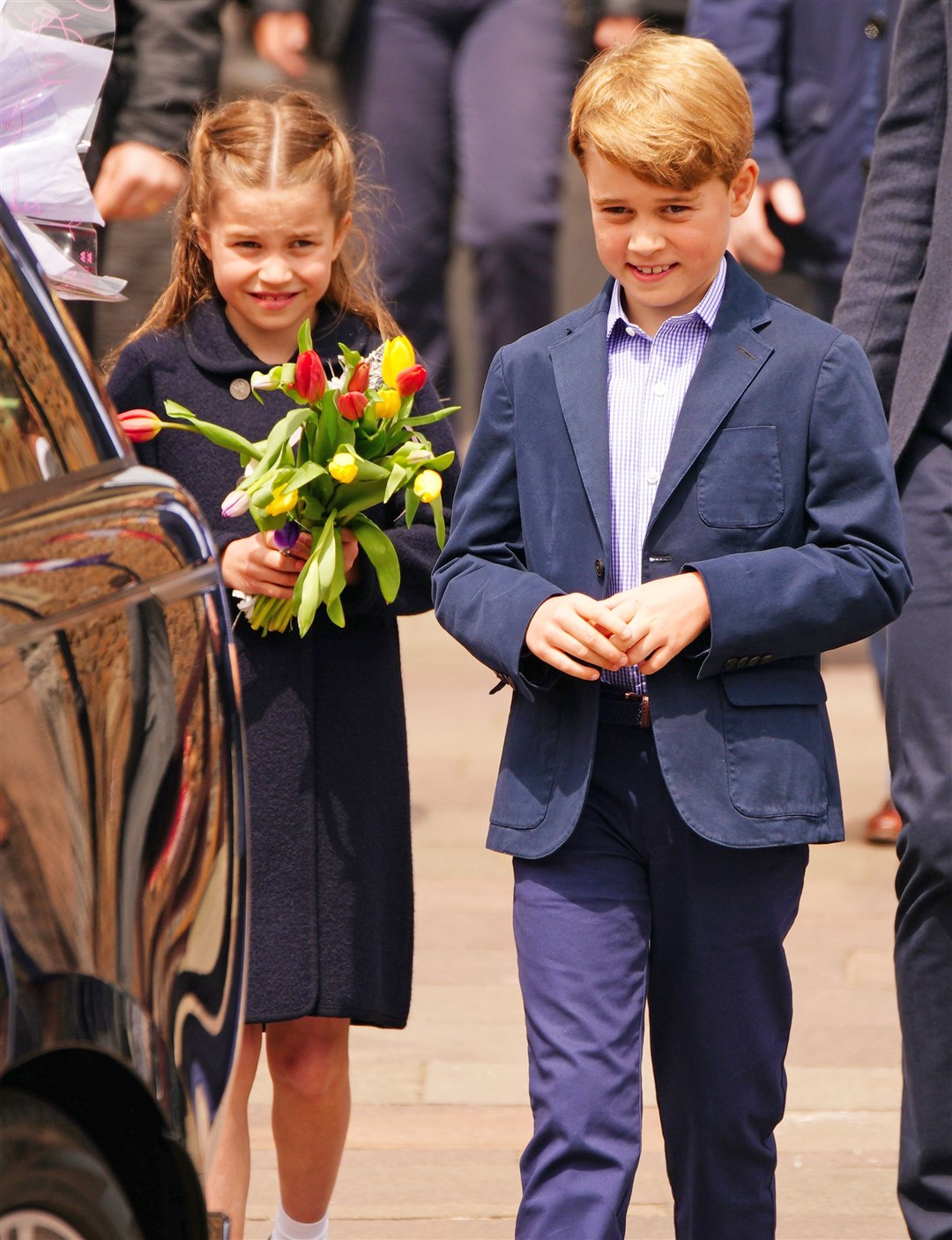 The young royals were given flowers at the castle (Ben Birchall/PA)