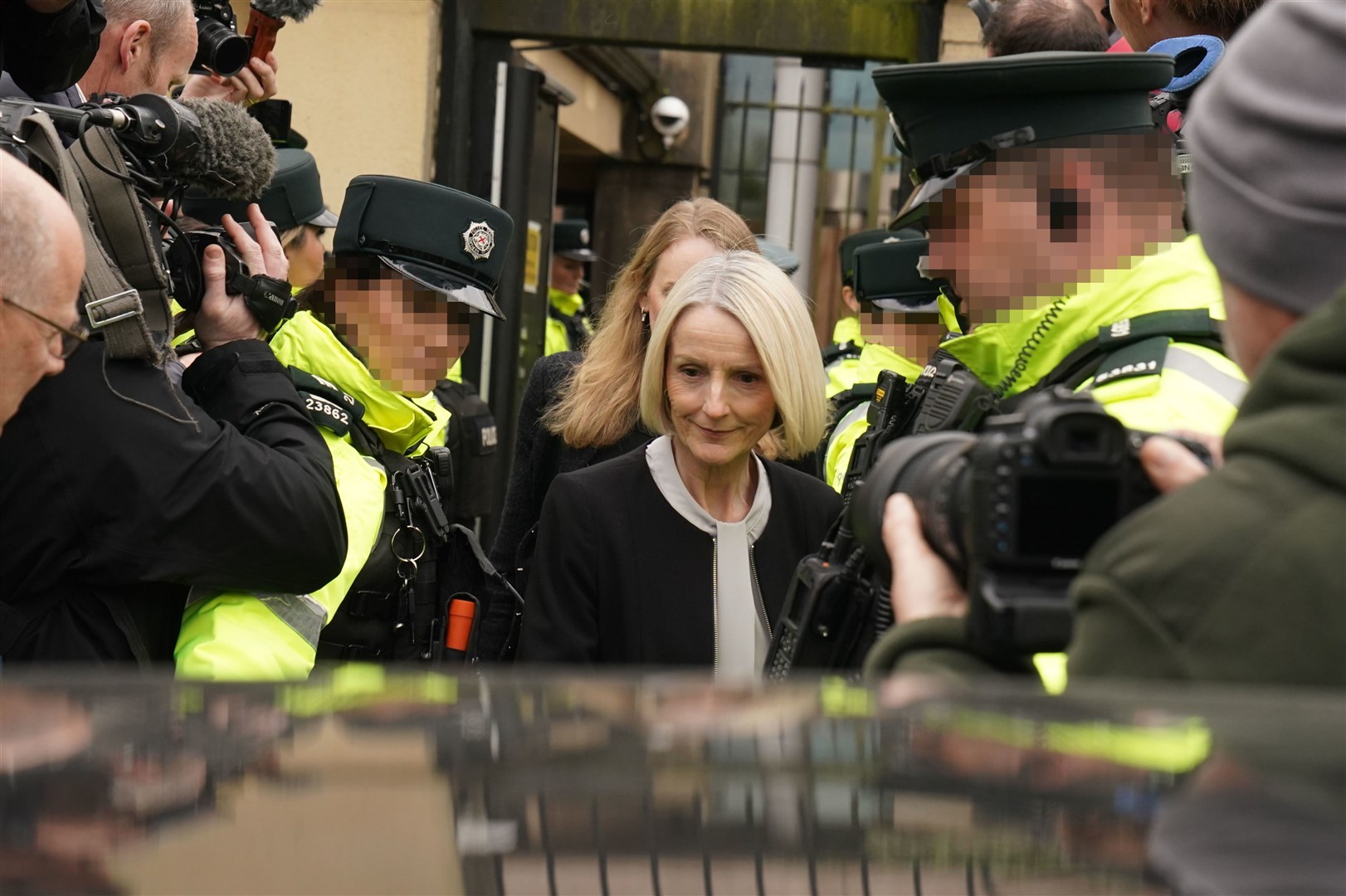 Eleanor Donaldson leaves Newry Magistrates’ Court, after appearing to face charges of aiding and abetting in connection with alleged offences committed by her husband (Brian Lawless/PA)