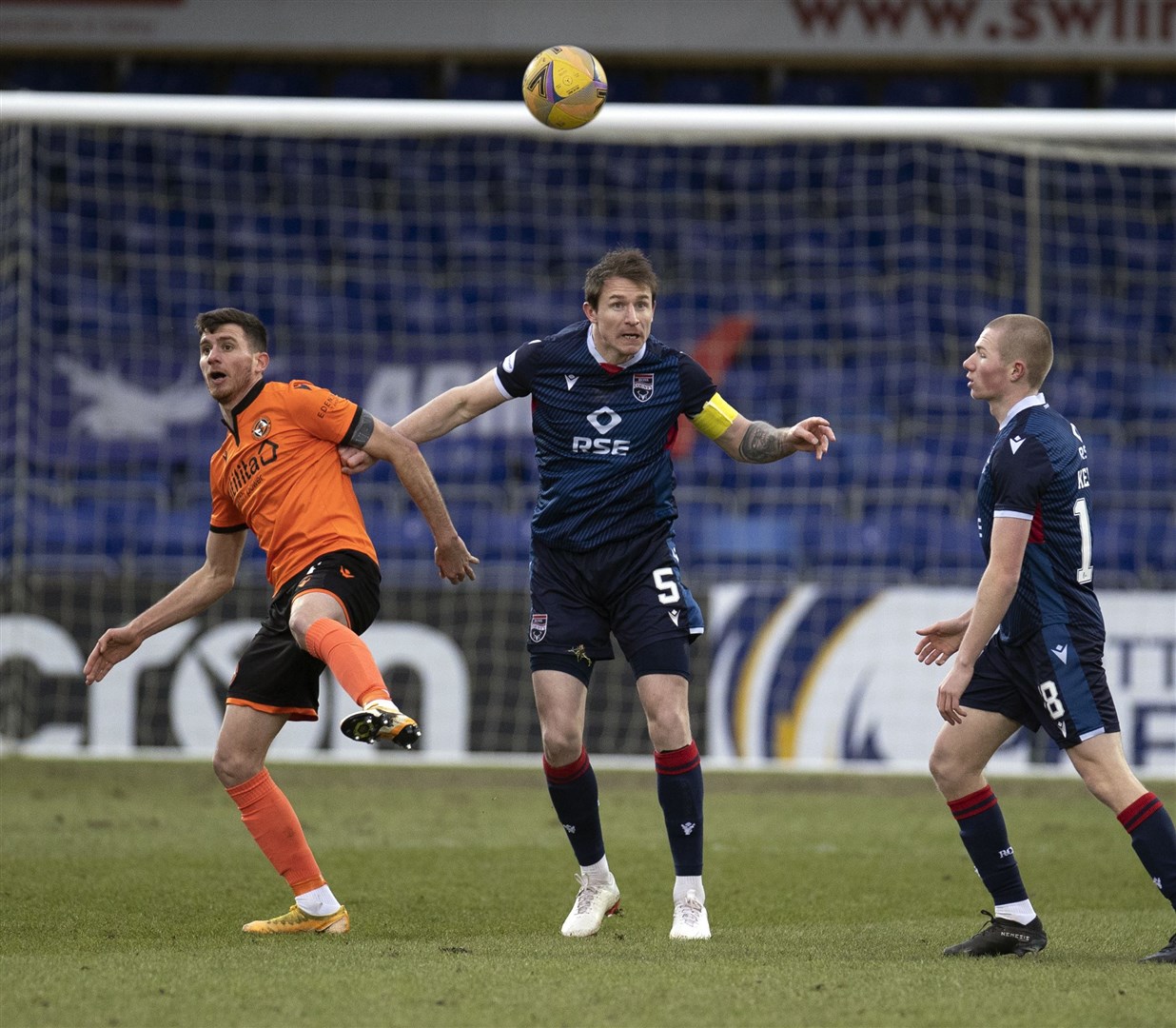Picture - Ken Macpherson, Inverness. Ross County(0) v Dundee Utd(2). 06/02/21. Ross County's Callum Morris heads clear from Dundee Utd's Adrian Sporle.