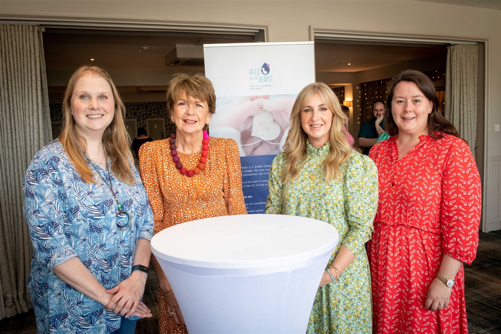 Victoria Erasmus, owner of Glen Mhor Hotel, HITA director Marina Huggett, Nicola Welsh chief executive of Held In Our Hearts and the charity’s peer supporter and hospital liaison, Lindsay Donaldson. Picture: Callum Mackay