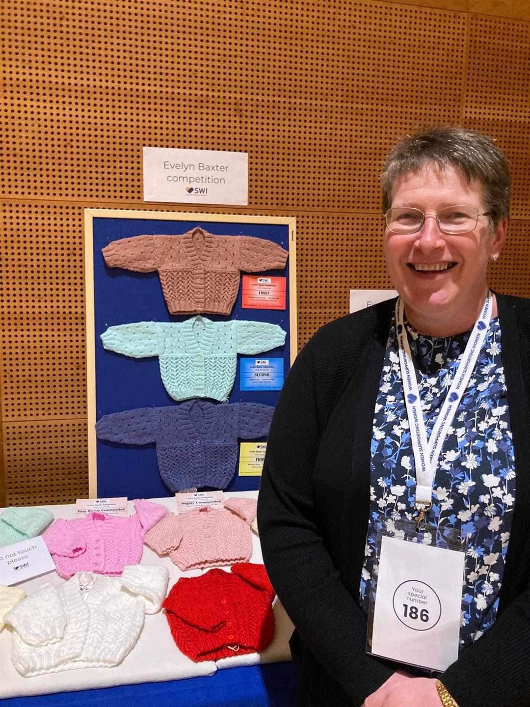 Christine Pokernecki next to her entry. Picture courtesy of Ross-shire and Sutherland Federation SWI
