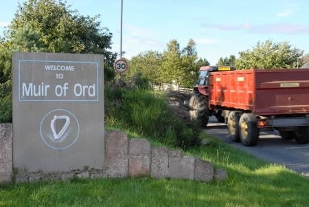 The welcome sign on the entrance to Muir of Ord
