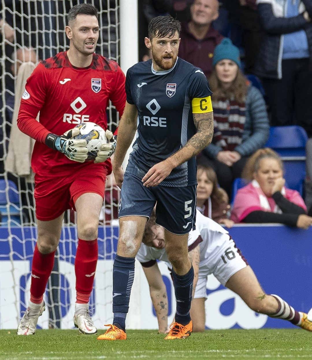 Ross County's Jack Baldwin with keeper Ross Laidlaw.