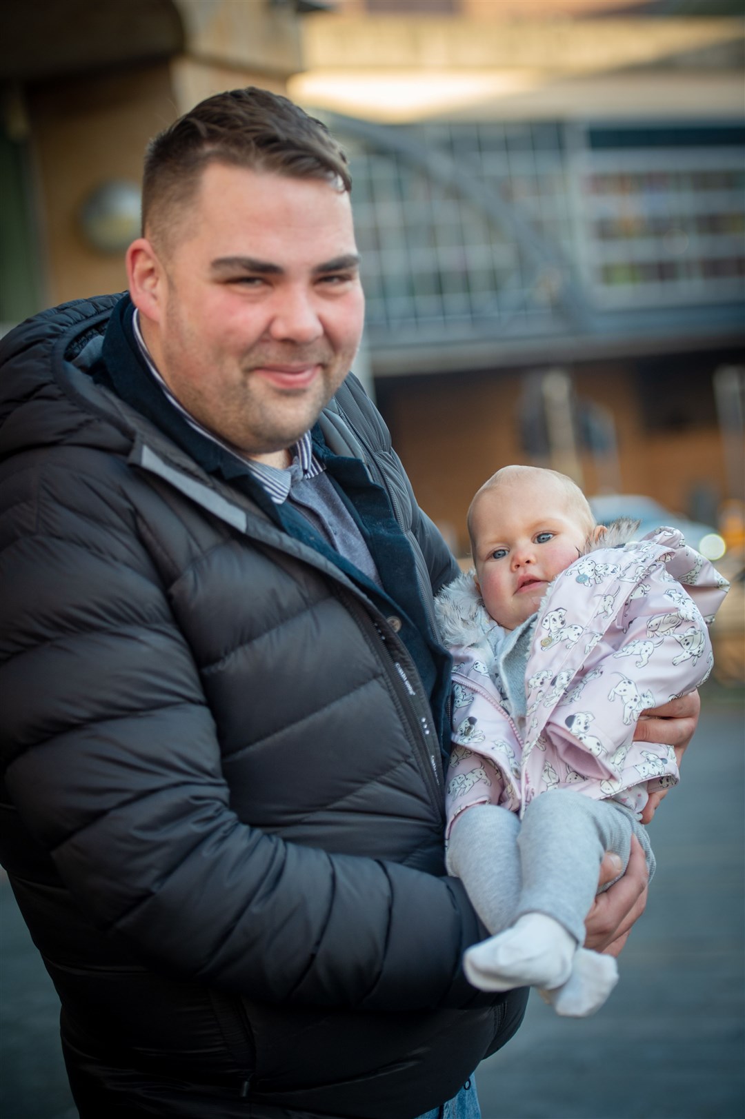 Peat & Diesel drummer Ully Macleod left holding baby Ava-Rose Taylor before the set. Picture: Callum Mackay