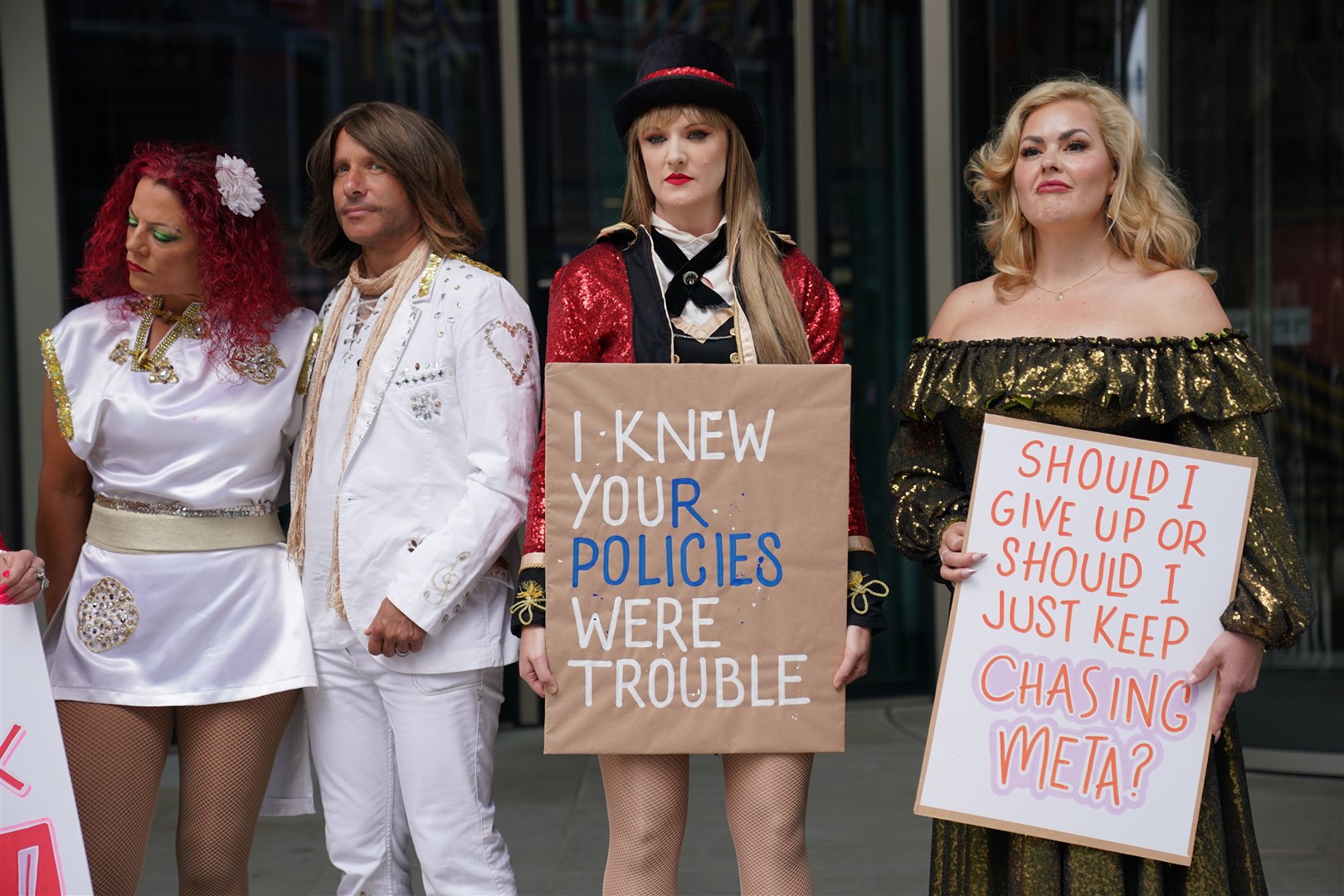 Celebrity impersonators banned from Facebook protest outside the offices of parent company Meta in King’s Cross, London (Lucy North/PA)
