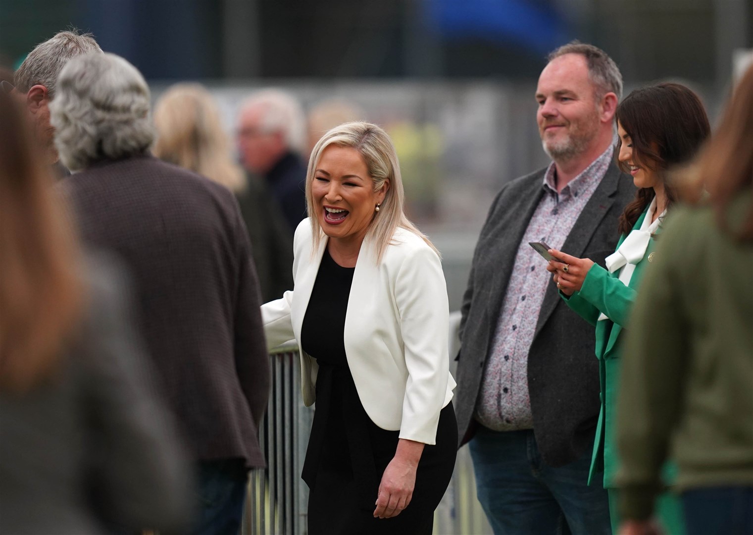 Michelle O’Neill (centre) at the election count centre at Meadowbank Sports arena in Magherafelt (Niall Carson/PA)