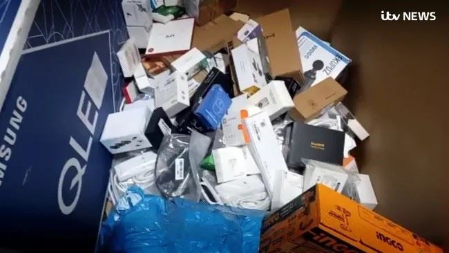 Various technology products found sorted into boxes marked ‘destroy’ at the Amazon Fulfilment Centre in Dunfermline (ITV/PA)