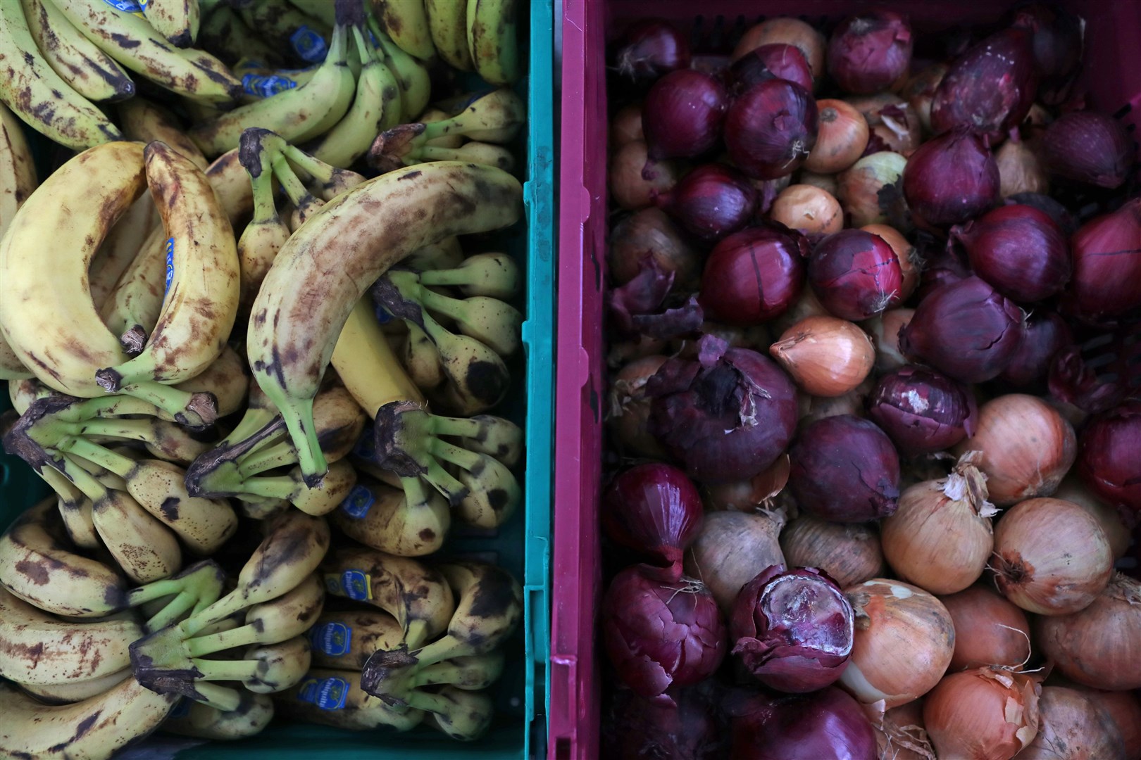 Food laid out in crates at a food bank in north London, amid a rise in the number of people relying on handouts (Luciana Guerra/PA)