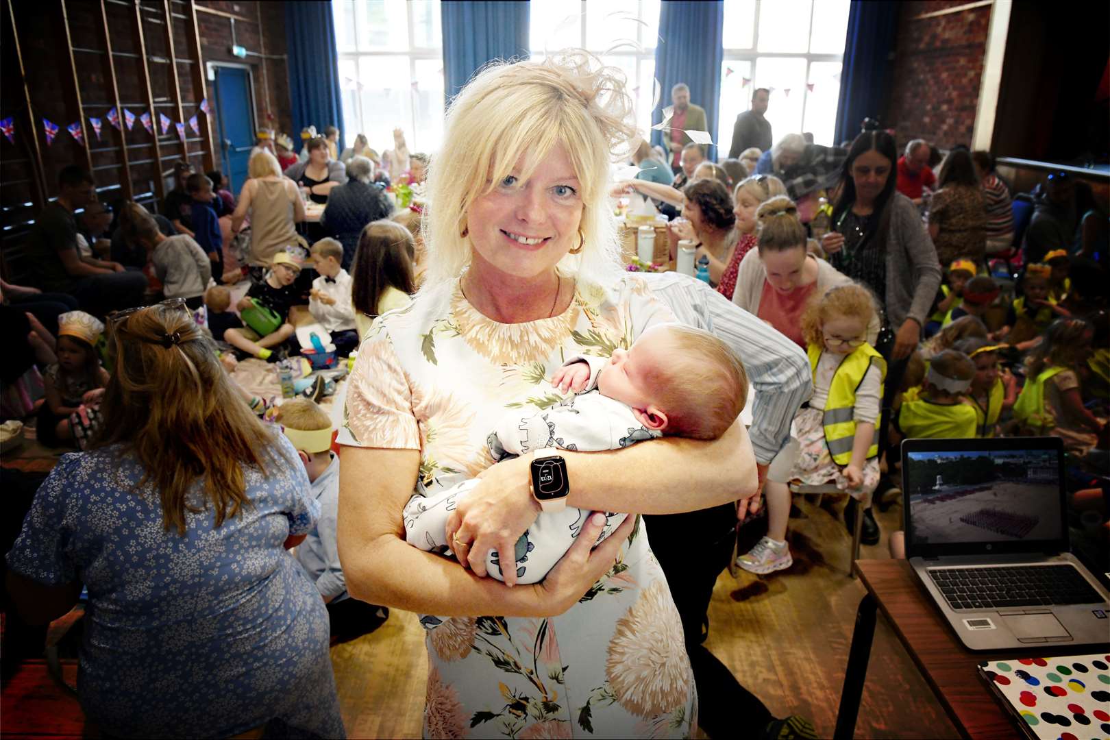 Tracy Sinclair with the youngest attendee, David Berkenheger, who is one month old. Picture: James Mackenzie