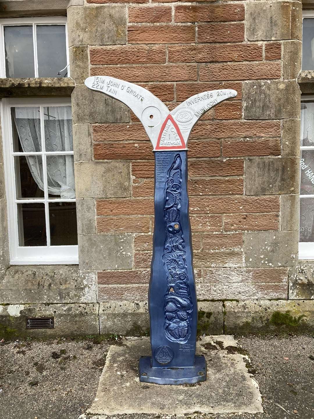 Milepost at Dingwall railway station – before its fresh lick of paint.