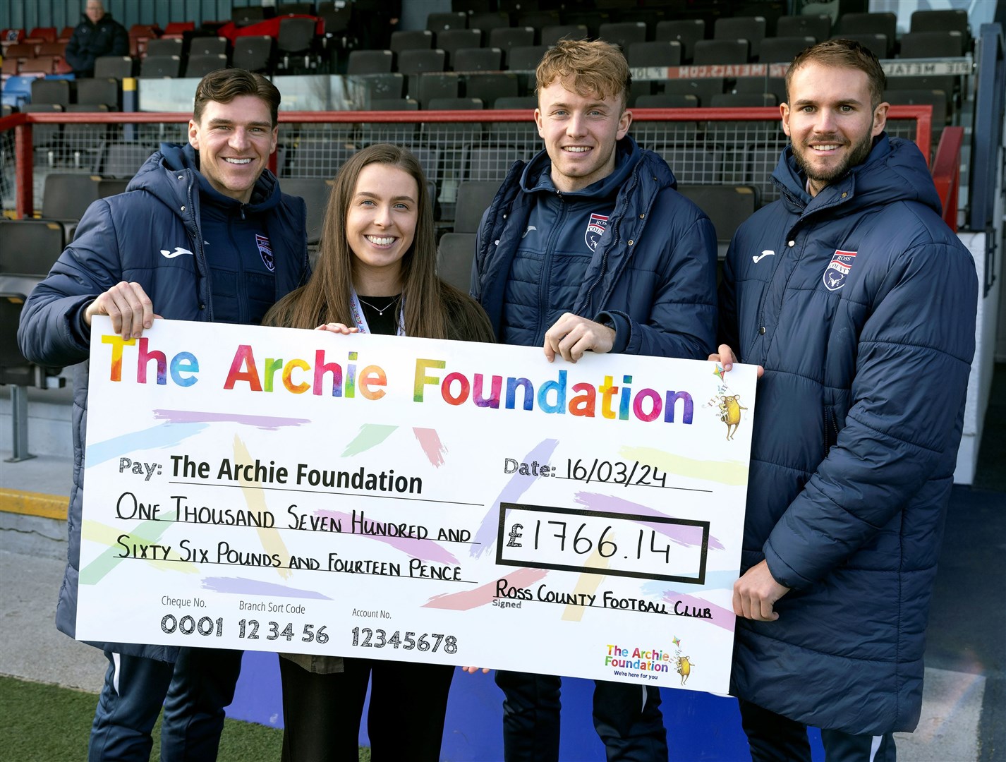 Ross County handing the donation cheque to the Archie Foundation. Picture: Ken Macpherson.