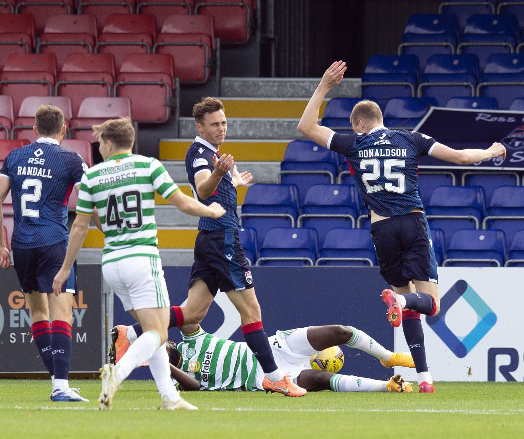 Ross County's Jordan Tillson protests after Odsonne Edouard’s early tumble earned Celtic a penalty. Picture: Ken Macpherson