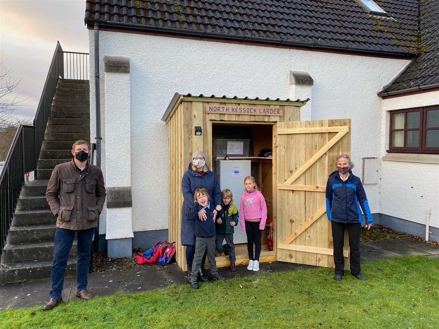The Kessock Kindness larder is now open. Pictured from left are Ben Perry, Milo Graham, Lucy Graham, Alasdair Perry, Harriet Perry and Anne Thomas.