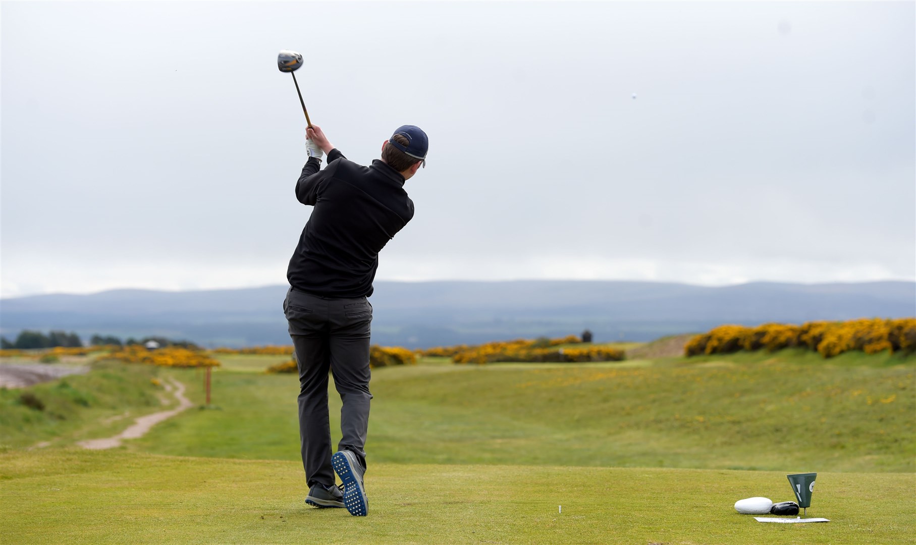 Black Isle Cancer Research Branch Golf Day,Fortrose and Rosemarkie Golf Club...Jonathan Aston drives off from the 1st tee...Picture: Callum Mackay. Image No. 043857.
