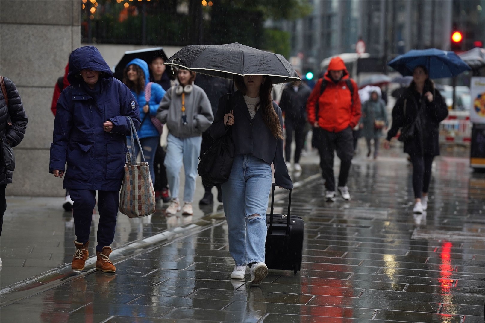 London has also experienced heavy rain (Lucy North/PA)