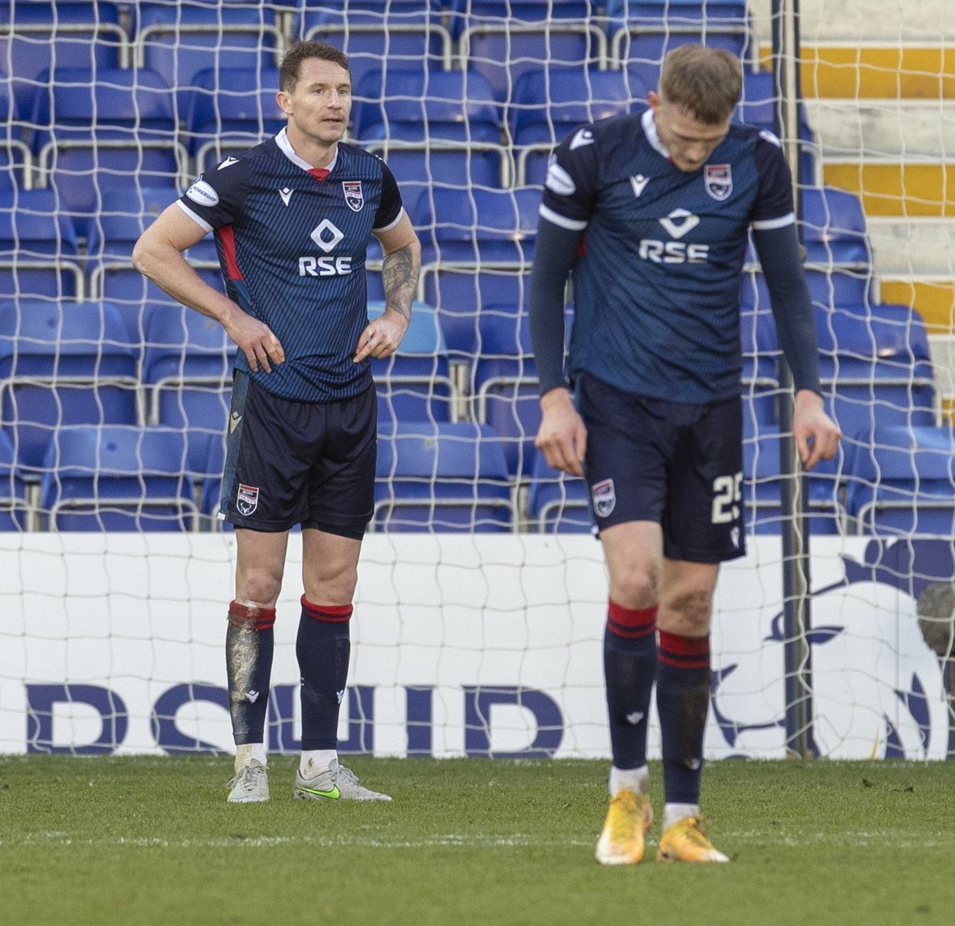 Picture - Ken Macpherson, Inverness. Ross County(0) v Rangers(4). 06.12.20. Ross County's Callum Morris and Coll Donaldson are disappointed after the late goal from Rangers' Jermain Defoe.