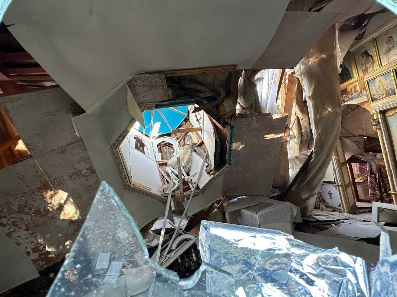 The wrecked interior of a bombed church.