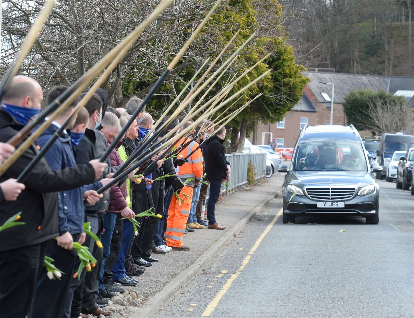 Funeral cortege of former world pool champion Gavin Phillips passes the guard of honour. Picture HNM staff
